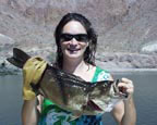 Katherine spears her first grouper.